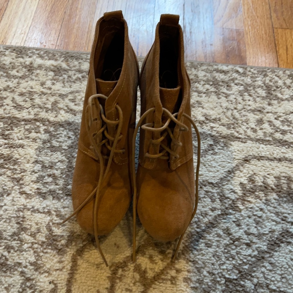 Jessica Simpson lace up wedge booties.